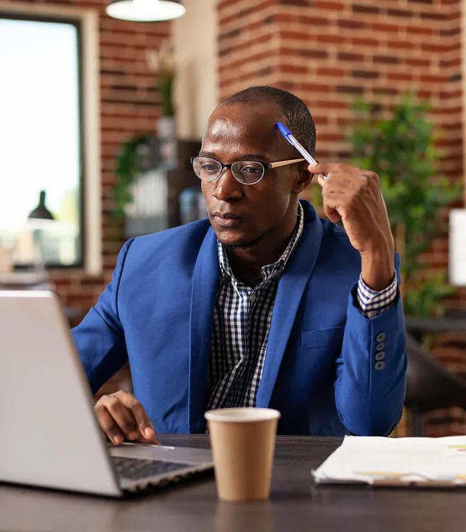 Startup business owner looking at website design options