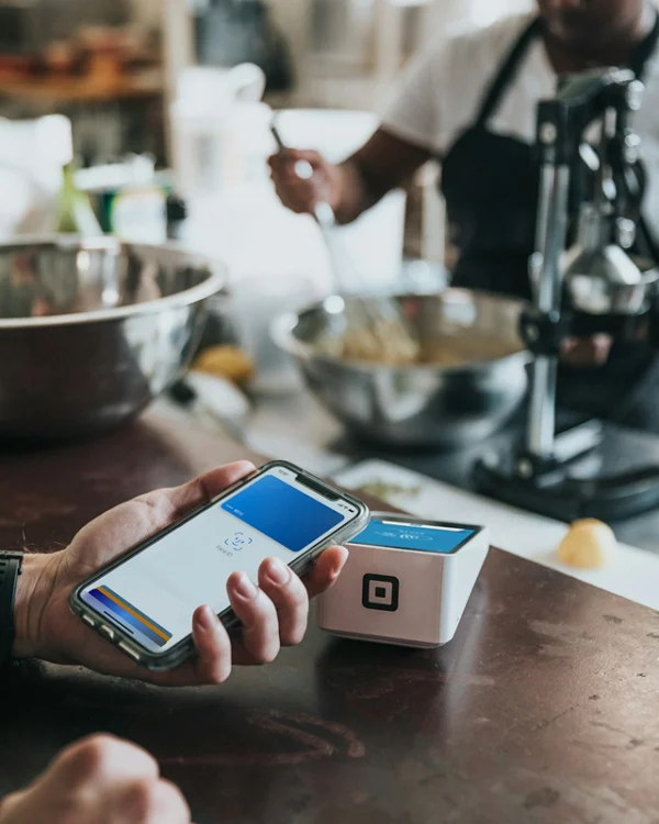 Customer scanning a POS QR code to make an online payment.